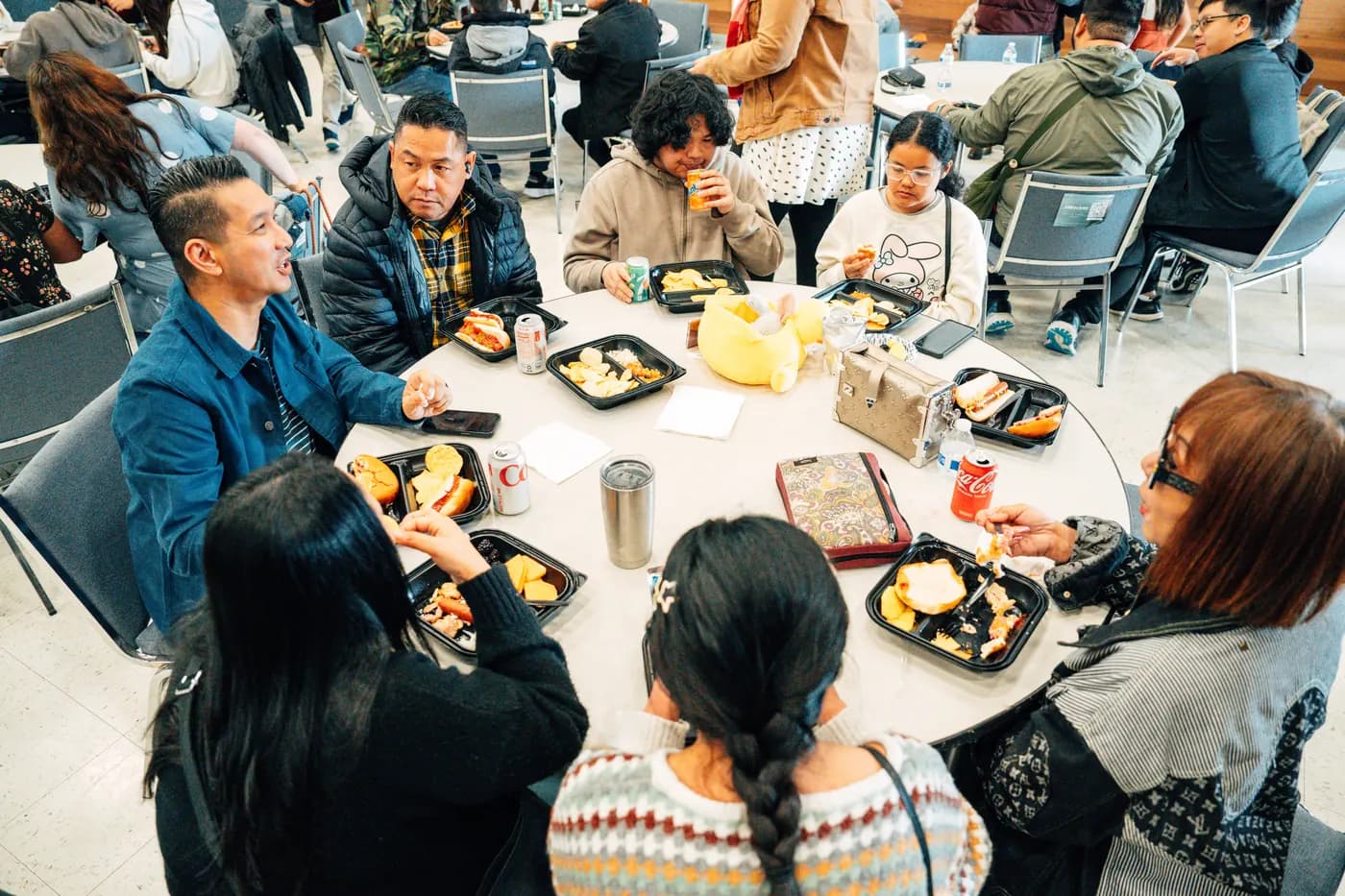People sharing a meal and talking together